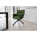 Moderná otočná tmavozelená jedálenská stolička Corvin s poťahom z kože a textilu s kovovými čiernymi nožičkami 87 cm