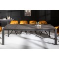 Obdĺžnikový rozkladací jedálenský stôl s tmavou keramickou doskou a kovovými nohami