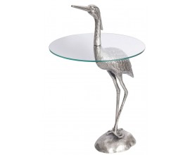 Dizajnový okrúhly príručný stolík Ardea so skulpturálnou podstavou v tvare volavky v striebornej farbe 88 cm