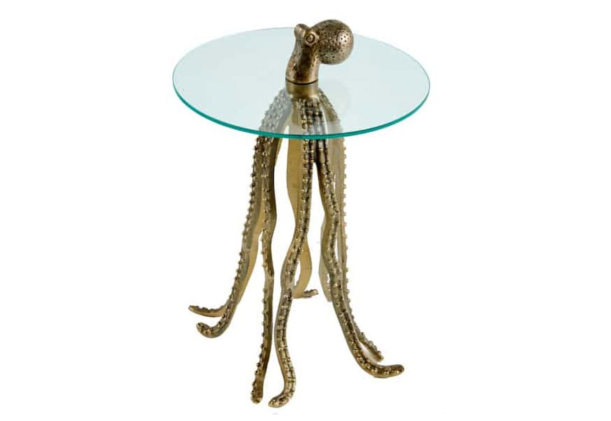 Nápaditý príručný stolík s okrúhlou sklenenou doskou a výraznou podstavou v tvare chobotnice z kovu so zlatou povrchovou úpravou – originálny dizajn pre odvážne interiéry.