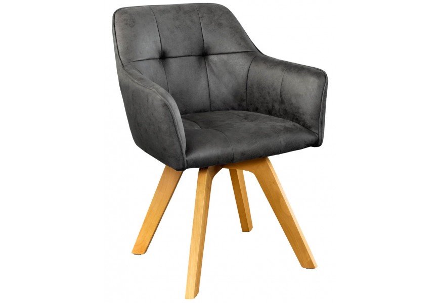 Moderné čalúnené kreslo s operadlom a integrovanými opierkami na ruky, sivým zamatovým poťahom a dekoratívnym prešívaním na sedacej a chrbtovej časti.