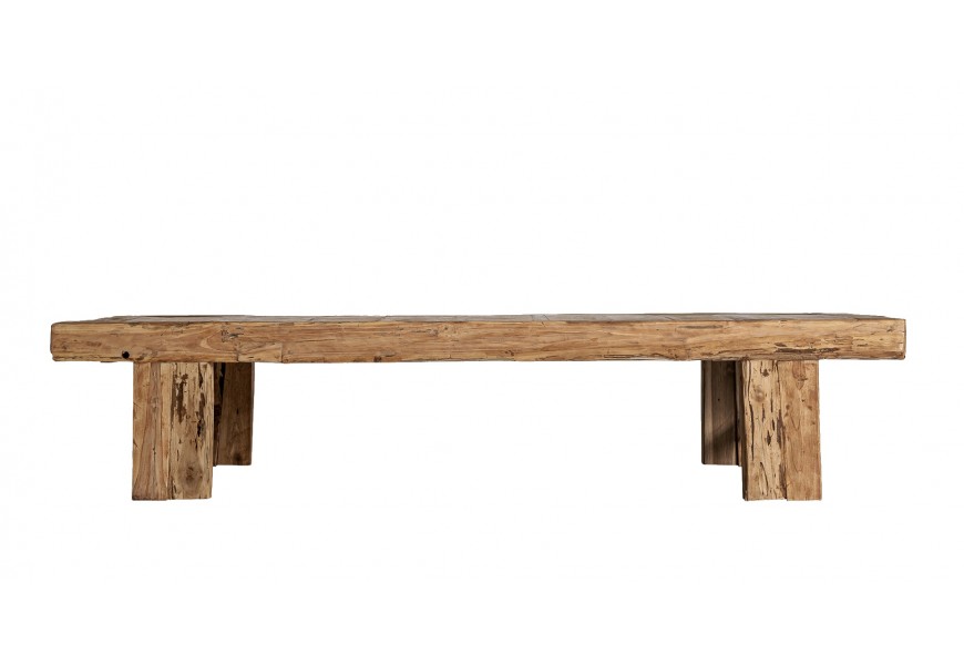 Koloniálny obdĺžnikový konferenčný stolík Maderas z masívneho teakového dreva v hnedom prírodnom odtieni s viditeľnou štruktúrou a nožičkami so spojnicou