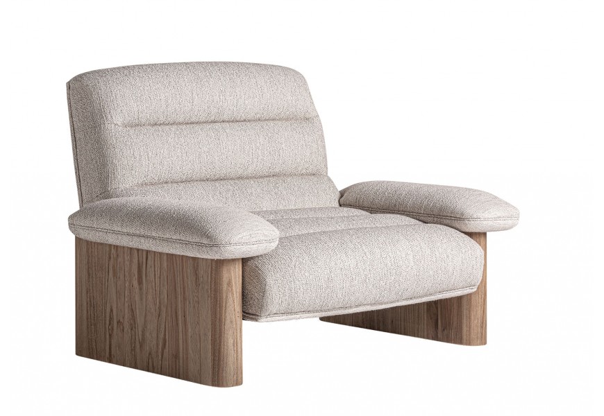 Moderné luxusné kreslo Jacque v béžovej farbe s valcovým prešívaním operadla a sedadla a masívnou drevenou dubovou konštrukciou