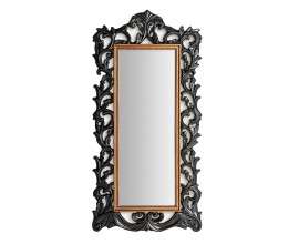 Luxusné klasické zrkadlo Gerald s obdĺžnikovým tvarom s bohato vyrezávaným rámom v čiernej farbe s rastlinnými motívmi a hnedým vnútorným lemom s dekoračnou reťazou
