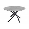 Moderný okrúhly jedálenský stôl s čiernou kovovou prekríženou podstavou a s antracitovou keramickou doskou s betónovým vzhľadom