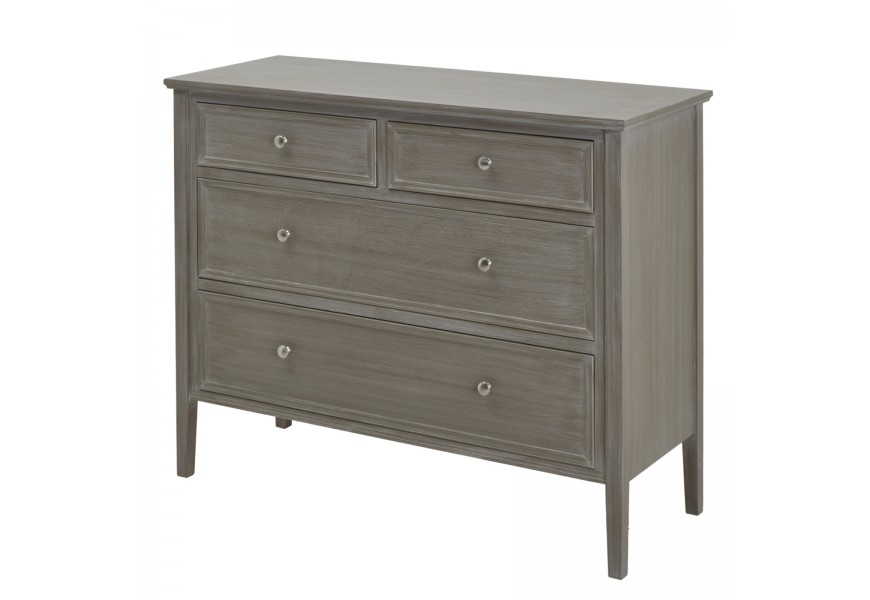 Vintage komoda Montclair z masívneho dreva so štyrmi zásuvkami, kovovými úchytkami a vysokými zužujúcimi sa nožičkami v prírodne sivom odtieni