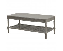 Luxusný rustikálny drevený konferenčný stolík Elmont s obdĺžnikovou sivou doskou a spodnou policou z prírodného ratanového viedenského výpletu s vyrezávanými nožičkami