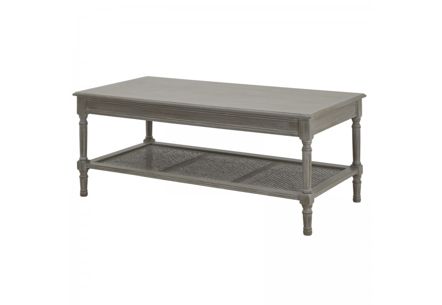 Luxusný rustikálny drevený konferenčný stolík Elmont s obdĺžnikovou sivou doskou a spodnou policou z prírodného ratanového viedenského výpletu s vyrezávanými nožičkami