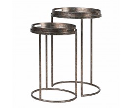 Industriálna sada dvoch okrúhlych príručných stolíkov Rust v striebornej farbe s hrdzavou patinou s kovovou konštrukciou a vyvýšenými okrajmi s úchytkami a zrkadlovou doskou s obrazom paliem