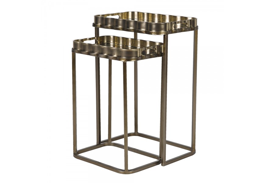 Industriálna sada obdĺžnikových príručných stolíkov Golem v zlatej kovovej konštrukcii so zaoblenými rohmi so zrkadlovou doskou s farebným kvetinovým motívom s vyvýšeným okrajom s bočnými úchytkami a štyrmi kovovými nohami