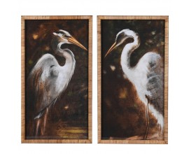 Etno set obrazov Heron s dvojicou volaviek na tmavom pozadí v obdĺžnikovom formáte s prírodným hnedým ratanovým rámom so zadnou výstužou z dyhovaného dreva