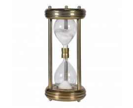 Dizajnová vintage dekorácia presýpacie hodiny Malabar s konštrukciou z hliníku v starožitnej zlatej farbe s okrúhlym podstavcom so sklenenými nádobami s bielym meracím pieskom