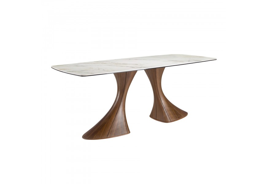 Luxusný masívny jedálenský stôl Vita Naturale s porcelánovou obdĺžnikovou doskou s mramorovým vzorom so sivým a hnedým žilkovaním s dvomi atypickými nožičkami z dreva v tmavohnedej farbe