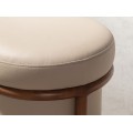 Luxusná moderná okrúhla taburetka Vita Naturale v béžovým koženým poťahom a hnedou dizajnovou konštrukciou 40 cm