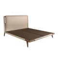 Luxusná moderná manželská posteľ Charmoin s béžovým čalúneným čelom z ekokože s orechovo hnedým masívnym rámom 188 cm