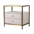 Luxusný art deco krémový nočný stolík Auron so zlatou konštrukciou a sklenenou doskou s dvomi zásuvkami 65 cm