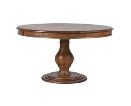 Luxusný koloniálny okrúhly jedálenský stôl Vina z masívneho dreva v hnedom odtieni a vyrezávanou nohou v tvare vázy s kaskádovou podstavou