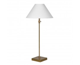 Luxusná glamour stolná lampa Tarkten so štíhlou zlatou kovovou nohou so štvorcovou podstavou a okrúhlym dole rozšíreným tienidlom z ľanu v bielej farbe