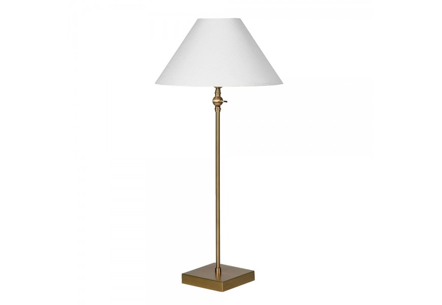 Luxusná glamour stolná lampa Tarkten so štíhlou zlatou kovovou nohou so štvorcovou podstavou a okrúhlym dole rozšíreným tienidlom z ľanu v bielej farbe