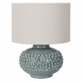 Dizajnová keramická stolná lampa Gladis s okrúhlou keramickou podstavou s reliéfnymi okrúhlymi výbežkami v pastelovej tyrkysovo modrej farbe s lesklou glazúrou s okrúhlym tienidlom s ľanovej textílie v bielej farbe