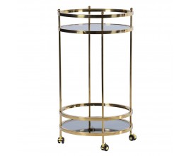 Dizajnový glamour servírovací vozík Tianna s dvomi okrúhlymi doskami zo skla so sivým dymovým efektom s konštrukciou na kolieskach z kovu v zlatej farbe
