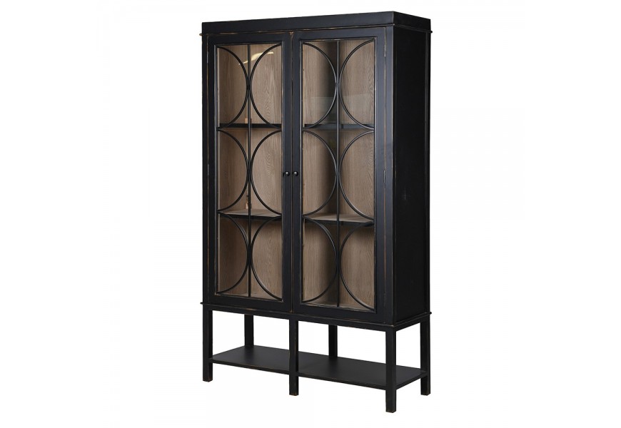 Luxusná vintage vitrína Antello s dvojitými presklenými dvierkami s geometrickou ozdobnou výplňou na dlhých nožičkách s otvorenou policou s čiernym lakovaním a vnútorným úložným priestorom v prírodnej hnedej farbe dreva