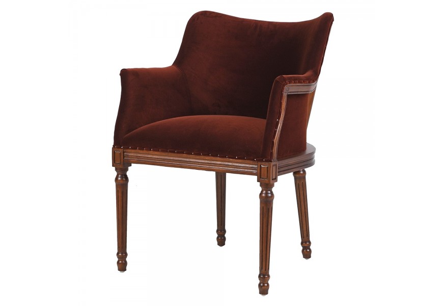 Luxusné vintage zamatové jedálenské kreslo Westend s poťahom v tehlovej hnedej farbe s vyrezávanými drevenými nožičkami a rámom v hnedom prevedení so zaoblenou chrbtovou opierkou a opierkami na ruky