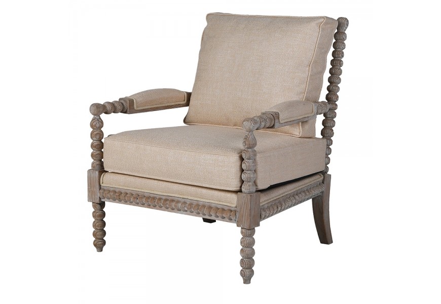 Luxusné dizajnové kreslo Boia s masívnym rámom z mahagónového dreva v svetlej hnedej farbe s vyrezávanými guličkami na opierkach a nožičkách s čalúnením s poťahom v béžovej farbe zo zmesi ľanu a mikrovlákna