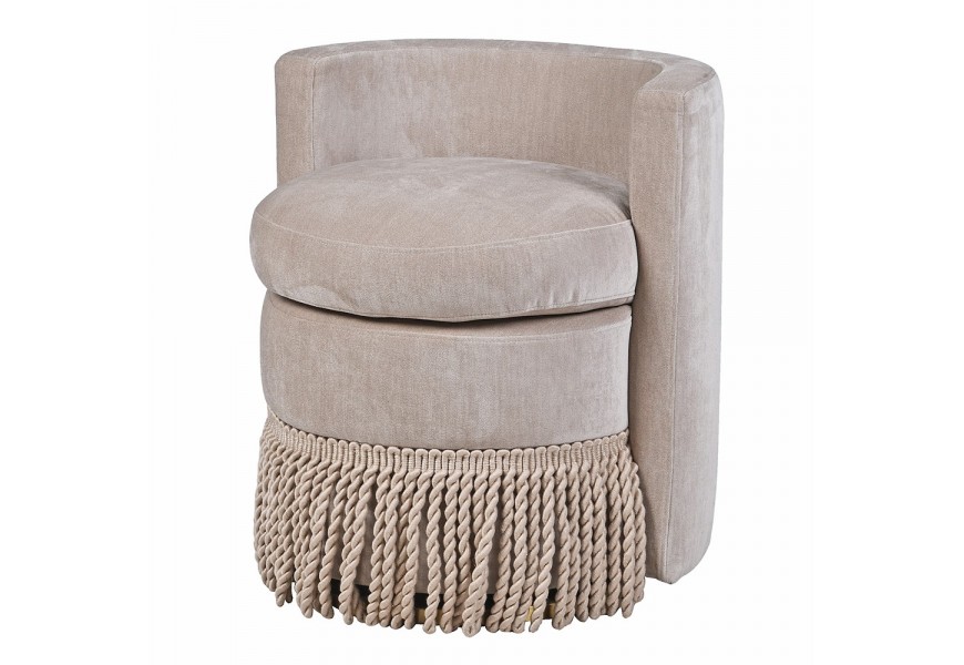 Glamour béžové dizajnové otočné kreslo Trist okrúhleho tvaru s chrbtovou opierkou s okrúhlym vankúšom na sedenie s dekoratívnymi strapcami s kovovou podstavou v zlatej farbe