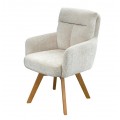 Moderné škandinávske jedálenské kreslo Dover s čalúnením a poťahom zo ženilkovej textílie v krémovej béžovej farbe s otočným sedadlom a opierkami na ruky s prešívaným opierkovým vankúšom a masívnymi nohami z bukového dreva v naturálnej svetlej hnedej farbe